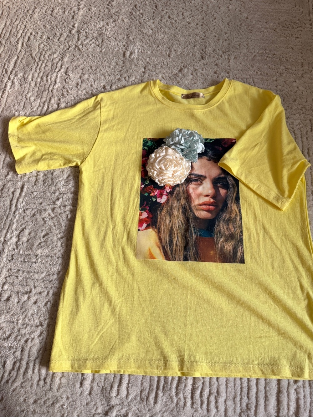 Vibrant Yellow Graphic Portrait Tee with Floral Accent